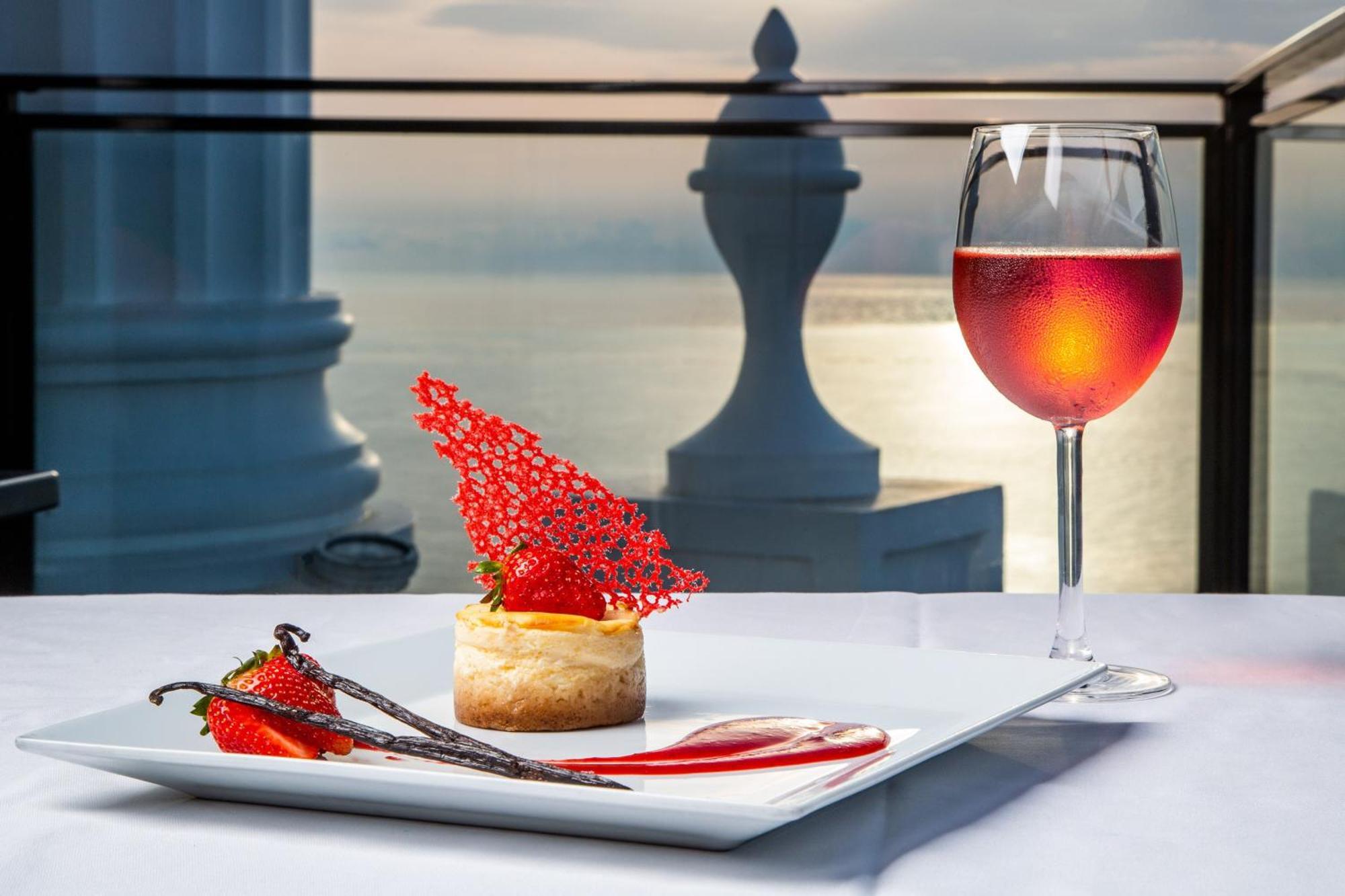 Sheraton Batumi Hotel Exterior photo A glass of wine