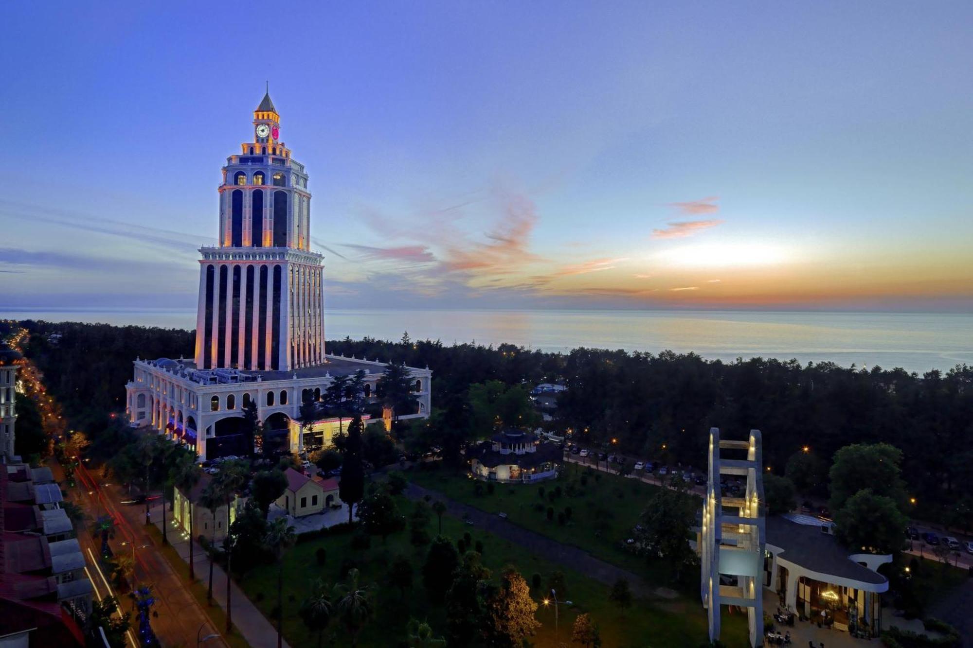 Sheraton Batumi Hotel Exterior photo The tower at sunset