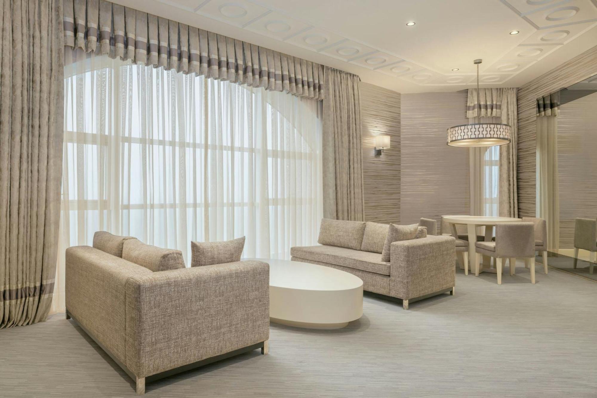 Sheraton Batumi Hotel Exterior photo A living room with a large window